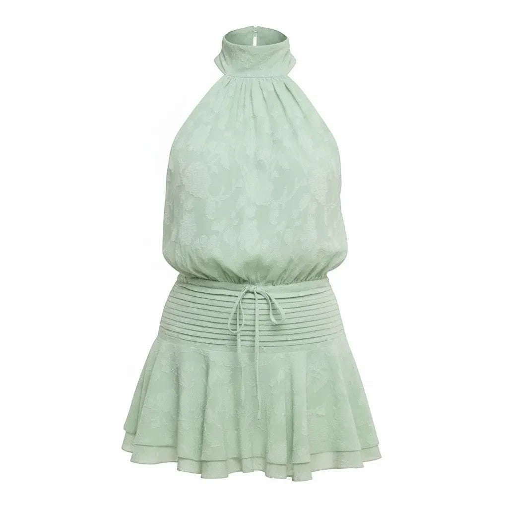 Mad-ly mint green floral jacquard halter mini dress with a smocked waist and ruffled hem in lightweight chiffon.
