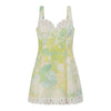 Mad-ly pastel floral mini dress with square neckline, white lace trim, and pom-pom detailing in a flared A-line cut.